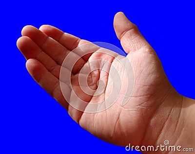 Boys Hand on Blue Stock Photo