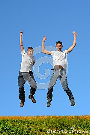 Boys jumping Stock Photo