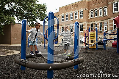 Boys Playing On A Playground Stock Photo