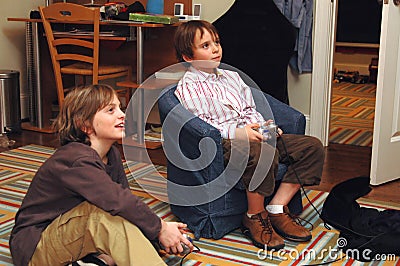 Boys playing video games Stock Photo