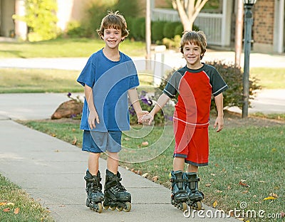 Boys Rollerblading Stock Photo