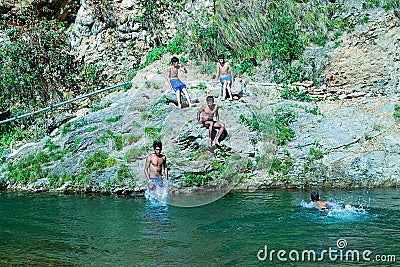 Boys swimming in fresh river water on a summer vacations Editorial Stock Photo