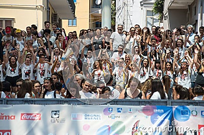 Boys waiting the actors on blue carpet Editorial Stock Photo