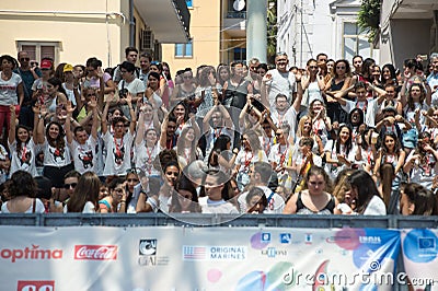 Boys waiting the actors on blue carpet Editorial Stock Photo