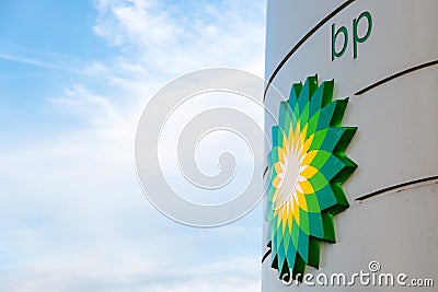 BP display stand with company redesign logo at petrol station in Editorial Stock Photo