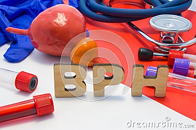 BPH concept of benign prostatic hypertrophy is enlargement of prostate gland. Medical abbreviation BPH is surrounded by models of Stock Photo