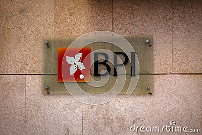 BPI (The Bank of the Philippine Islands) Logo on a stone wall Editorial Stock Photo