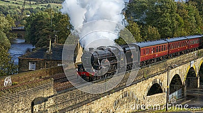 BR Black Five 4-6-0 leaving Brighouse station 2009 Editorial Stock Photo
