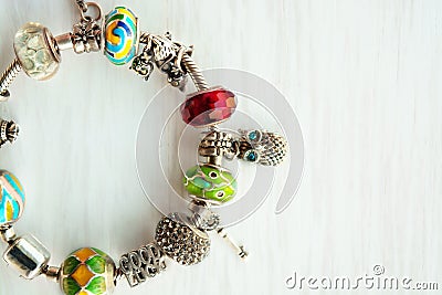 Bracelet with many accessories, luck, money, an owl Stock Photo