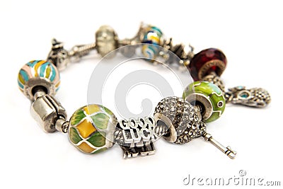 Bracelet with many accessories, luck, money, an owl Stock Photo