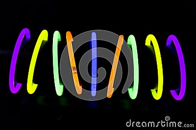 Bracelets made with glow sticks fluorescent lights Stock Photo