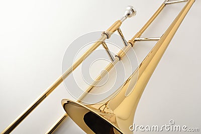 Braces and mouthpiece of a trombone on white table Stock Photo