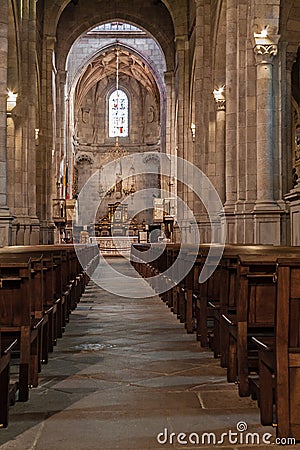 Braga, Portugal - December 28, 2017: Se de Braga Cathedral interior. Nave, main chapel and altar. Oldest Cathedral in Portugal. Editorial Stock Photo