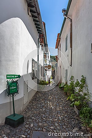 View typical street on Braganca city downtown, inside fortress, portuguese vernacular architecture Editorial Stock Photo