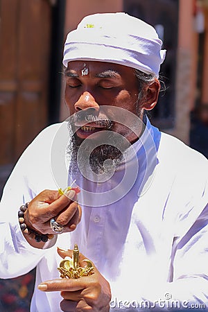 A brahmana in a trance state performs the ceremony. The religion of Hinduism on the island of Bali. Centuries-old Stock Photo