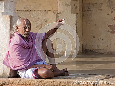 Brahmin Priest Spinning Thread. Editorial Stock Photo