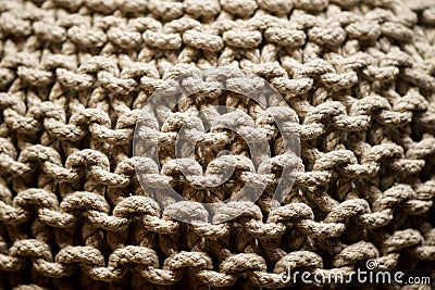 Braided into a coil of rough rope background Stock Photo