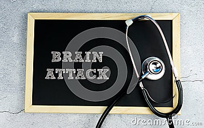 BRAIN ATTACK wrote on chalkboard with stethoscope Stock Photo