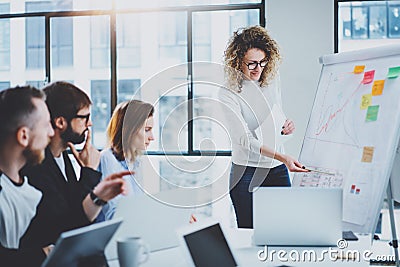 Brainstorming process at office.Young coworkers work together modern office studio.Horizontal.Blurred background.Cropped. Stock Photo