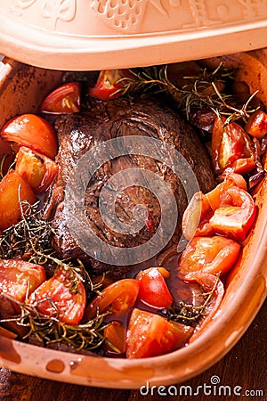 Braised beef in an earthenware casserole Stock Photo