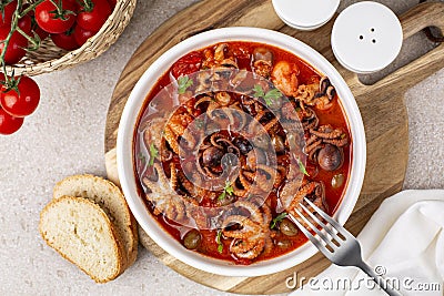 Braised octopus stew with tomato sauce Stock Photo