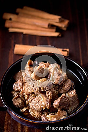 braised pork cartilage soup on wooden background Stock Photo