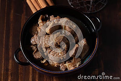 braised pork cartilage soup on wooden background Stock Photo