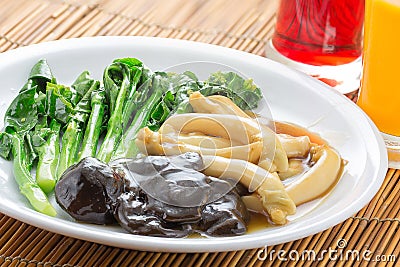 Braised Sea Clams with Kale Stock Photo