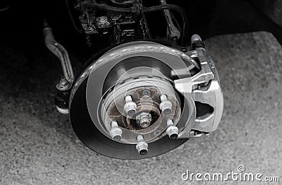 Brake disc and used brake pads on old car stock photo Stock Photo