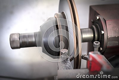 Brake lathe tool polishing disc brakes of cars working Stock Photo