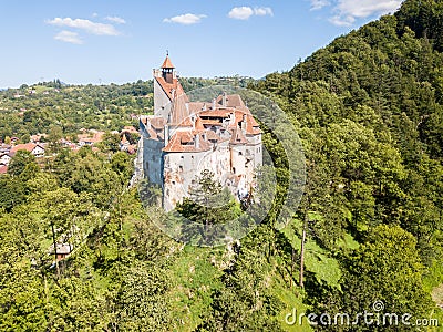 Bran castle on a hill. Dracula's Castle. Surrounded by Bran town, Wallachia, Transylvania, Romania. Stock Photo