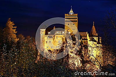 Bran Castle, medieval fortress, lighted at night - landmark attraction in Romania Stock Photo