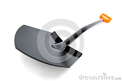 Brand new black metal spade or a shovel isolated over white background. Gardening equipment cut out studio shot. Stock Photo