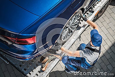 Brand New Car Home Delivery on Towing Truck Stock Photo
