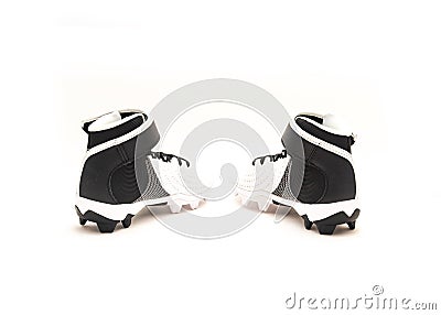 Brand new pair of baseball cleats, baseball shoes for kids isolated on white background Stock Photo