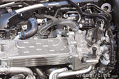 Brand new vehicle engine detail. Mechanic parts Stock Photo