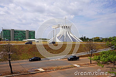 BRASILIA, BRAZIL - AUGUST 30, 2023: Sight on Brasilia the futuristic city with the Cathedral designed by Oscar Niemeyer, Brazil Editorial Stock Photo