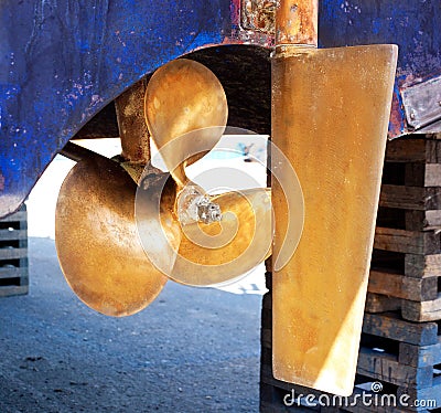 Brass boat propeller and steering Stock Photo