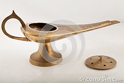 Brass far-eastern oil lamp, lid removed Stock Photo