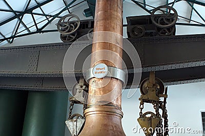 Brass fermentation vessel on display at the South African Brewery Editorial Stock Photo