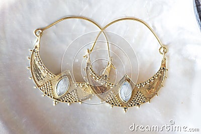 Brass pair of earrings in oriental style Stock Photo