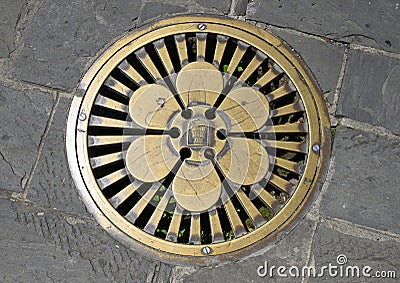 Brass Plate for access to underground electrical lines in Portofino, Italy. Stock Photo