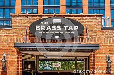 The Brass Tap Exterior Facade Brand and Logo Signage Advertising Editorial Stock Photo