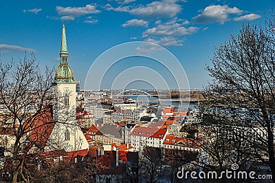 Bratislava cityscape view from the Bratislava Castle. St. Martin`s Cathedral and Apollo Bridge. Stock Photo