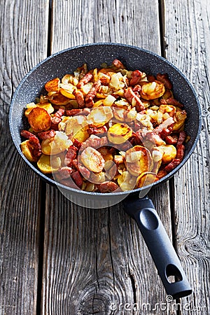 Bratkartoffeln, german potato with bacon and onion Stock Photo