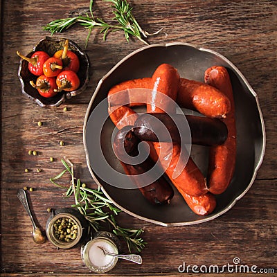 bratwurst grill with salt and pepper rosemary Stock Photo