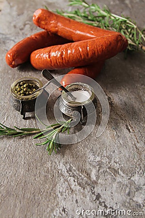 bratwurst grill with salt and pepper rosemary Stock Photo