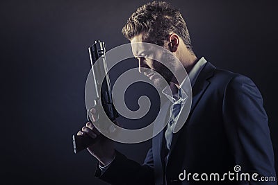 Brave man with dangerous weapon Stock Photo