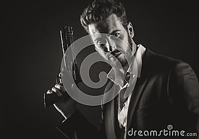 Brave man with dangerous weapon Stock Photo