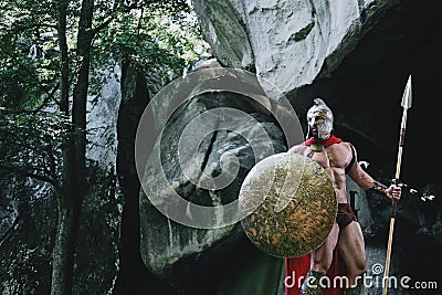 Spartan warrior in the woods Stock Photo